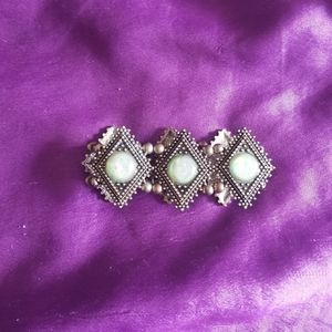 Earthbound's Opalescent chucky bracelet